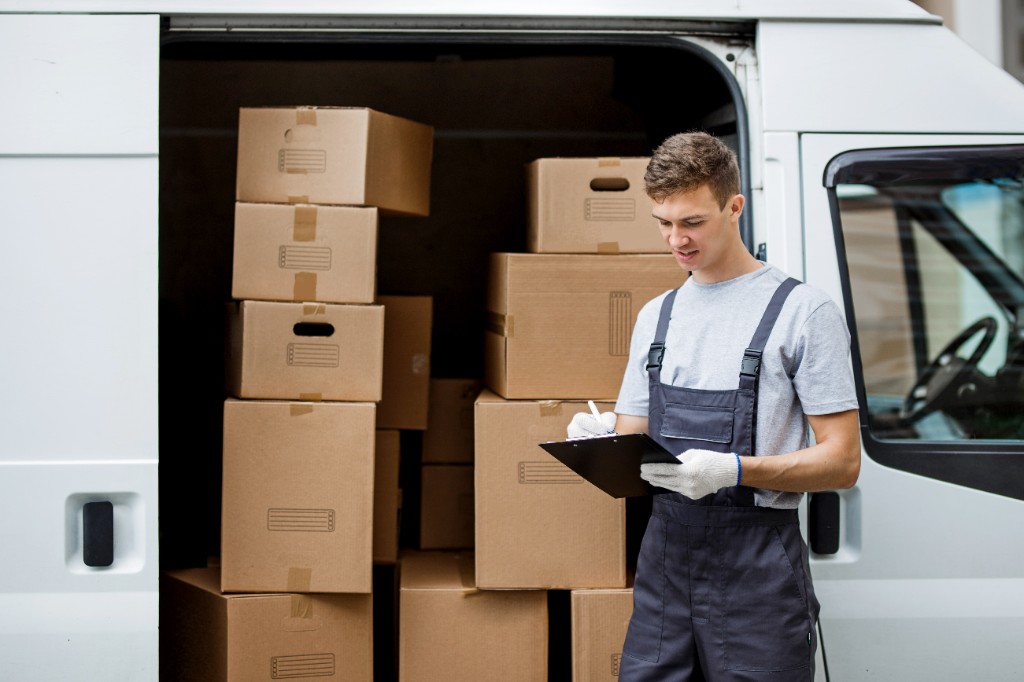 Mover unloading boxes and checking item inventory