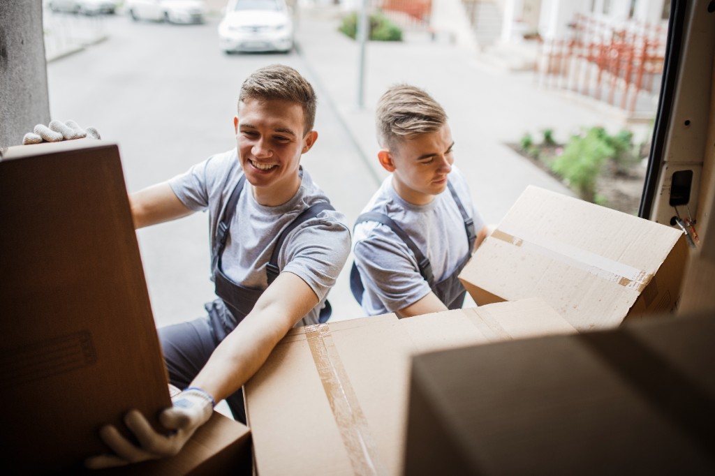 Movers loading a truck for long distance relocation