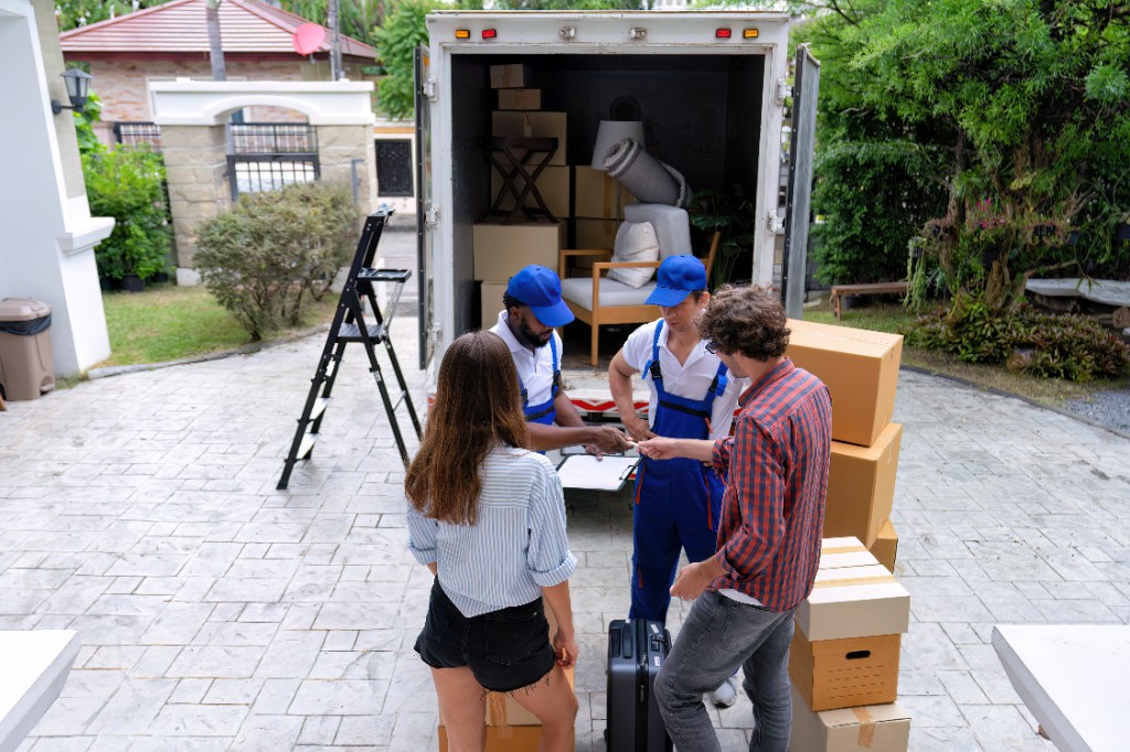 Moving delivery in front of a suburban home